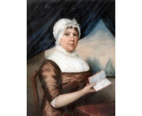 Early 19th Century English school - Pastel - Half-length portrait of a seated lady wearing white bonnet, holding a notebook, 