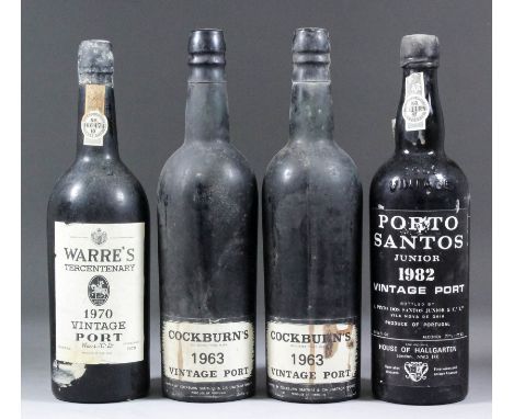 Two bottles of 1963 Cockburn's vintage port (with original wax seal - level just above shoulder), one bottle of 1970 Warre's 