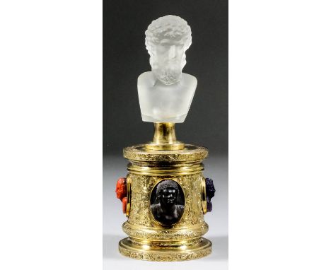 A 19th Century silver gilt cylindrical seal box, the lid surmounted by a frosted glass bust of Aristotle, on cylindrical base