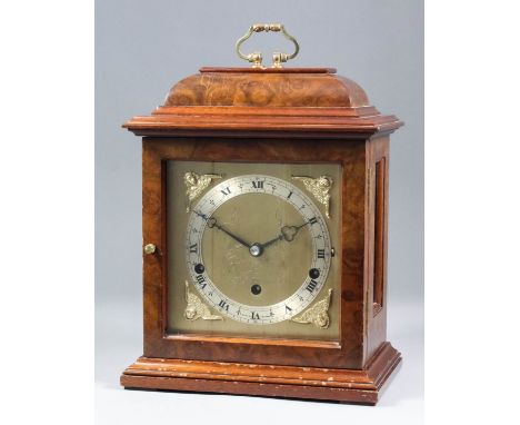 A 20th Century walnut cased mantel clock by Elliott of London, the square brass dial with silvered chapter ring with Roman an