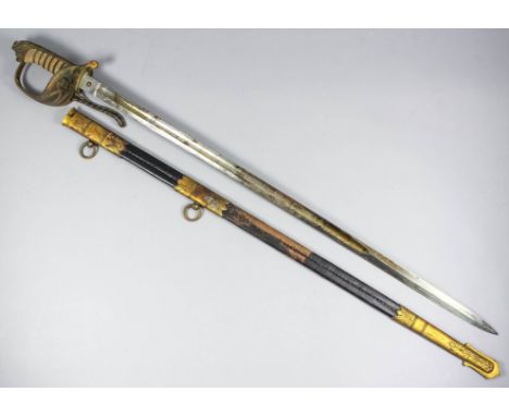 An 1897 pattern Naval officer's sword by J. R. Gaunt &amp; Son Ltd, London &amp; Birmingham, the 31ins bright steel blade dec