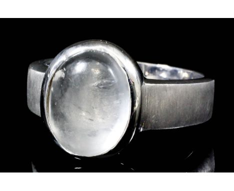 A modern 18ct white gold mounted solitaire moonstone ring, set with a cabochon moonstone (approximate weight 3ct), (size R - 