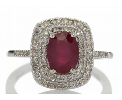 A stunning oval cut ruby 1.54 carats sits surrounded by a double halo set with fifty two single cut diamonds and eight single