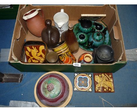 A quantity of china including; Poole vase, Canadian tea for one, Glenfiddich jug, Pottery cheese dome with wooden base, etc.