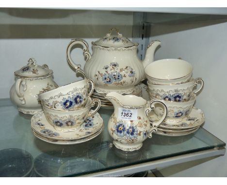 A Zsolnay Pecs, Cornflowers porcelain tea set to include teapot, milk jug, sucrier, four side plates, bread &amp; butter plat