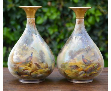 A pair of Royal Worcester hand painted Vases (H293) signed by James 'Jas' Stinton having pheasant and water scene, approx. 7 