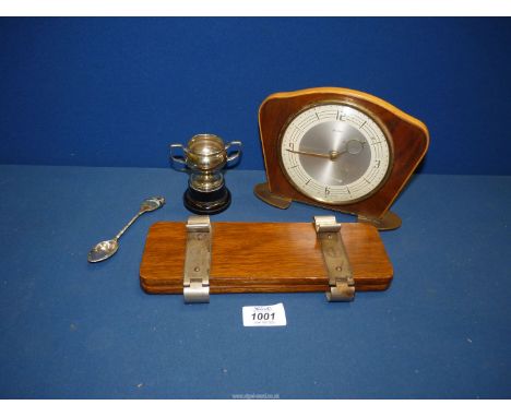 A quantity of miscellanea including tie press, Bentima clock, small trophy and spoon.