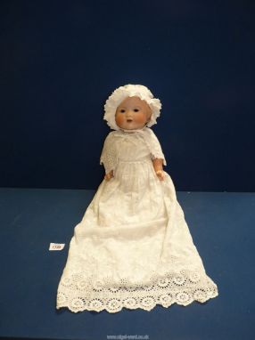 An Armand Marseille porcelain head Doll, marked made in Germany 'A.M no: 351-6K' to the base of the neck.