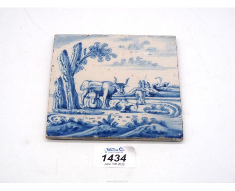 A Dutch Delft tile painted in blue with a characterful cow in a landscape, late 17th-early 18th century, 5'' square, some gla