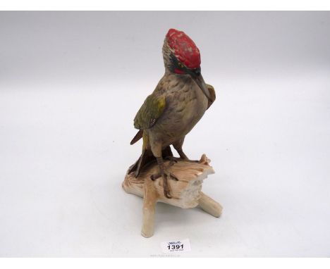 A Goebel Green Woodpecker, dated 1975, 10 1/2" tall.