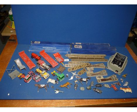 A quantity of Hornby Dublo rail track, points etc and diecast model cars and trucks, Britain's etc.
