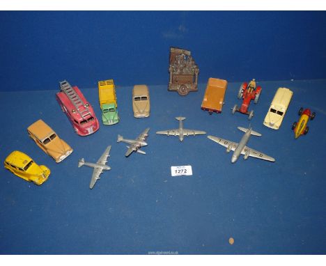 A box of 13 Dinky cars and planes including; Fire Engine, Dodge truck, Vanguard, etc. Together with a William Shakespeare doo