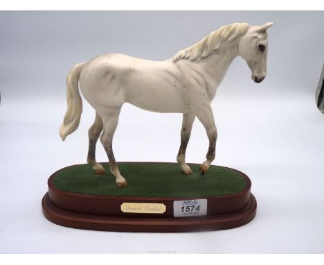 A Royal Doulton model of Desert Orchid, on wooden plinth