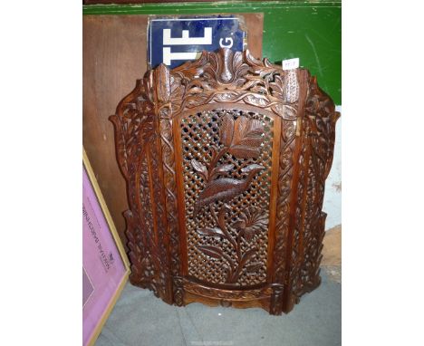 A folding Firescreen in carved wood with lattice, bird, floral and foliage detail.