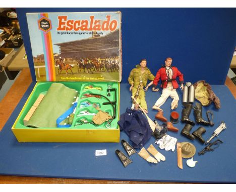 Two Action Man figures with accessories to include; boots, gloves, coats, rifles, etc. Together with a boxed Escalado horse r