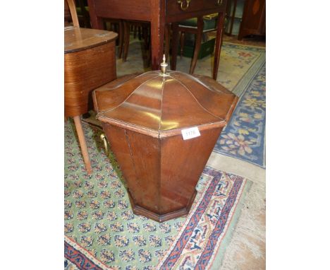 An octagonal shaped Mahogany wine cooler/coal bucket with lid and having brass loop handles, brass finial and metal liner (sp