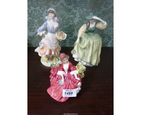 A quantity of Royal Doulton and Royal Worcester figures including 'Rosie Picking Apples', 'Lydia' and 'Buttercup'.