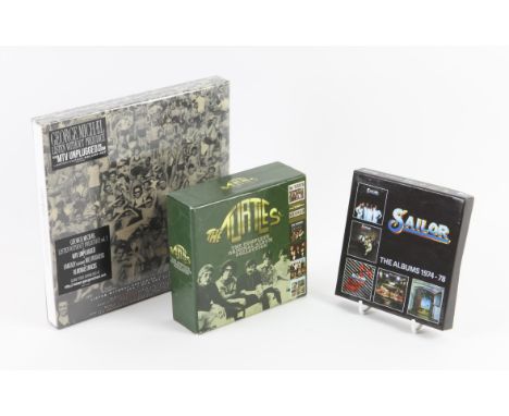 Three CD Boxsets, George Michael Listen without Prejudice (sealed), The Turtles Complete Original album collection, and Sailo