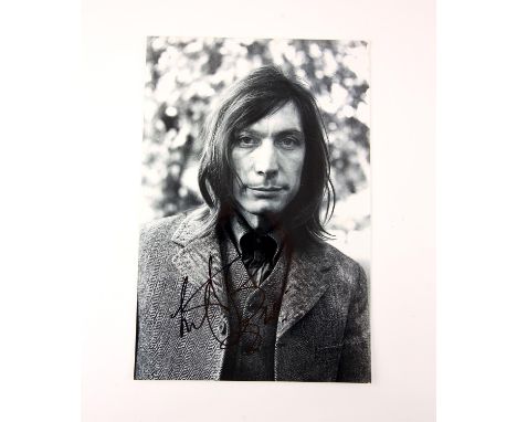 The Rolling Stones - Charlie Watts Signed photograph. Provenance: The vendor is an autograph collector and collected this in 