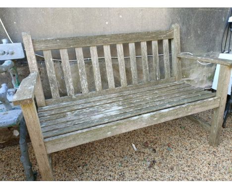 A teak garden bench, 127 cm wide