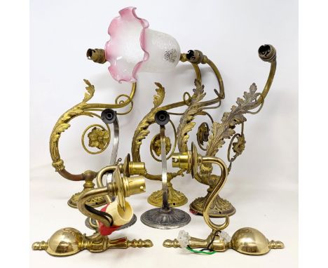 A gilt metal two branch wall light, 36 cm wide, a pair of matching single wall lights, a pair of silver plated wall lights, a