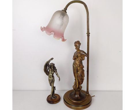 A spelter lamp with a figural base, 53 cm high, and an Art Nouveau style figure, 30 cm high (2)