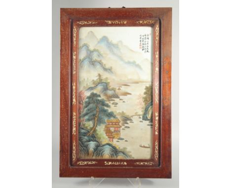 A CHINESE REPUBLIC PERIOD POLYCHROME PORCELAIN PANEL, encased with a bone inlaid wooden frame, panel depicting a landscape sc