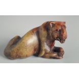 A CARVED HARDSTONE FIGURE OF A TIGER, 11cm long.