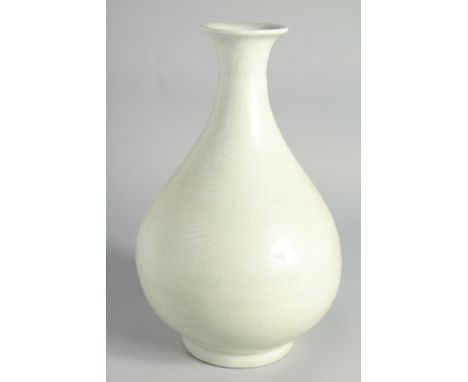 A CHINESE LIGHT-CELADON GLAZED CARVED PHOENIX YUHUCHUNPIN VASE, 32cm high.