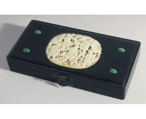 A CHINESE HARDSTONE BEADED ABACUS contained within a hardwood box - the box inset with carved jade panel, box 28cm x 14cm.