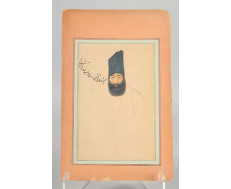 AN EARLY QAJAR PAINTED PORTRAIT ON PAPER, with inscription, 30.5cm x 19.5cm.