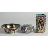 THREE CHINESE CLOISONNE ENAMELLED ITEMS, comprising a black ground bowl, a octagonal brush pot and a