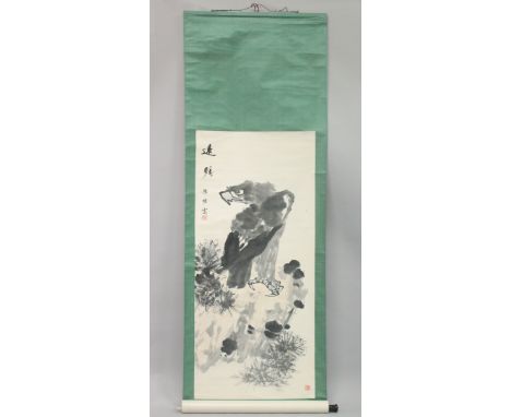 A LARGE CHINESE SCROLL PAINTING OF AN EAGLE, with calligraphy and two red seal marks, image 133cm x 60cm.