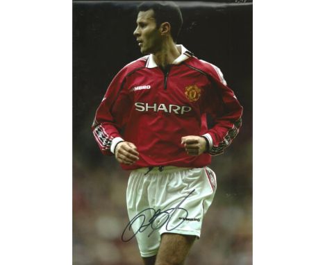 Football Ryan Giggs 12x8 signed colour photo pictured playing for Manchester United. Good condition Est. 