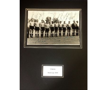 Football Uruguay vintage 1954 mounted b/w photo signed by 16 of the then Football world champions. Good condition Est. 