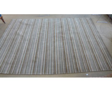 A fawn ground handmade contemporary wool carpet - 300cm x 200cm