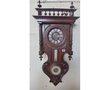A walnut Continental wall clock with barometer and thermometer - Height 90cn