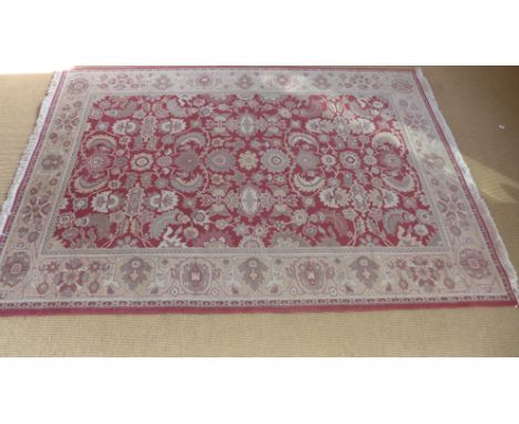 A red ground hand made Ziegler carpet 2.50m x 1.75m