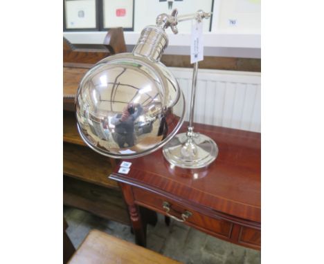 A nickel plated desk lamp with three hinges - Height 8cm 
Condition report: As new