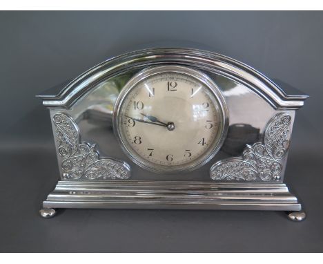 A chromium plated mantle clock with a French movement - Height 16cm x Width 25cm - clean working condition
