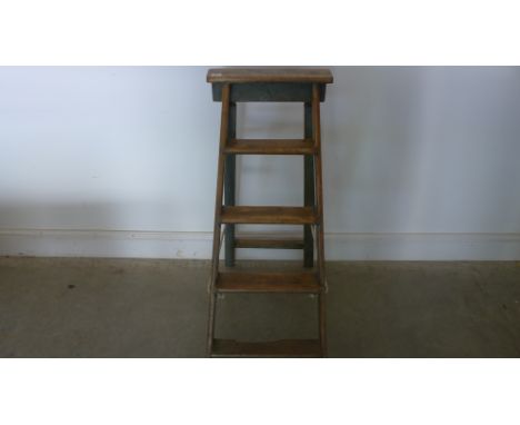 A small early 20th century pine step ladder with old original paint, very decorative - 70cm x 98cm x 41cm wide
Condition repo