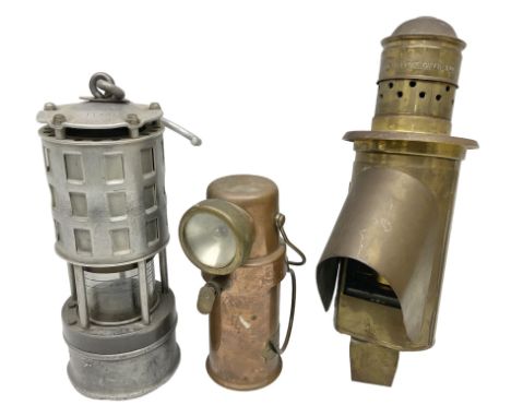Brass and copper miner's lamp by Ceag Ltd, Barnsley, together with a brass oil lamp by John Lilley and Gilley Limited and a m