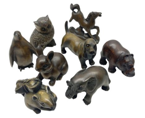 Eight netsuke, modelled as a rabbit, rat, elephant, rhino, dog, owl, penguin and horse