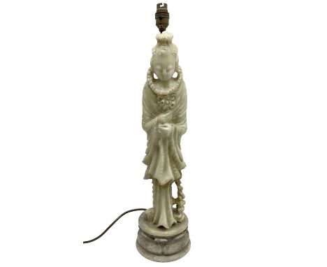 Carved soapstone lamp of Quan Yin on a lotus base, H56cm