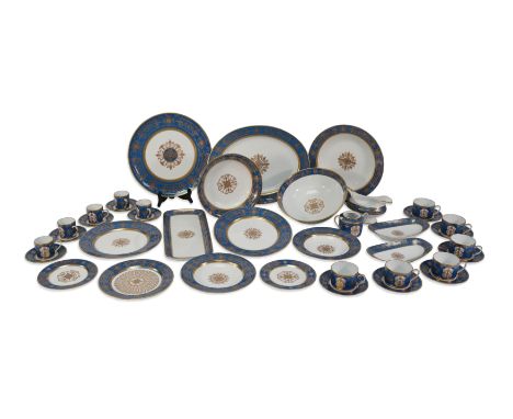 An exquisite Bernardaud 'Aux Rois' fourteen person dining and dessert service, comprising circular charger 32 cms d, oval ser