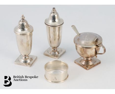 A silver cruet, comprising pepper, salt and mustard, Sheffield hallmark dated 1965, mm E.Viner, approx 176 gms and a single n