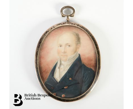 A. E Chalon RA (Swiss/English) George IV portrait miniature on ivory of a gentleman dressed in a blue frock coat with cream s