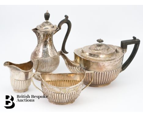 An Edwardian silver tea trio, London dated 1908, comprising tea pot, milk jug and sugar bowl mm William Hutton &amp; Sons tog