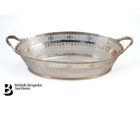 An oval George III silver bread basket, London dated 1783, mm Burrage Davenport, approx 32 x 19.5 cms, approx 700 gms/24.6oz.