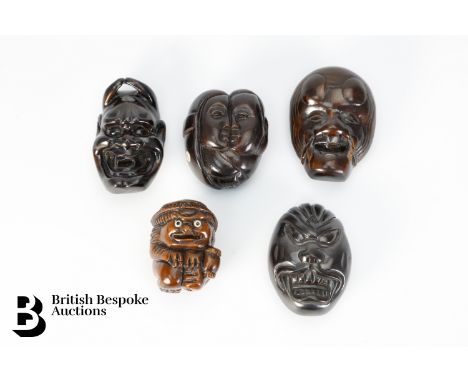 Collection of late 19th and early 20th century wood carved zoomorphic netsuke, including rabbit with a tortoiseshell on his b